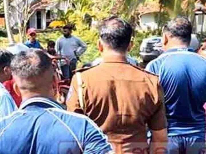 மகனைச் சுடுவதற்குத் துப்பாக்கியுடன் காத்திருந்த தந்தை கைது