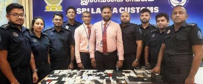 கணினி நிதி மோசடிகளுக்காக இலங்கை வந்த 9 சீனர்கள் கட்டுநாயக்கவில் கைது